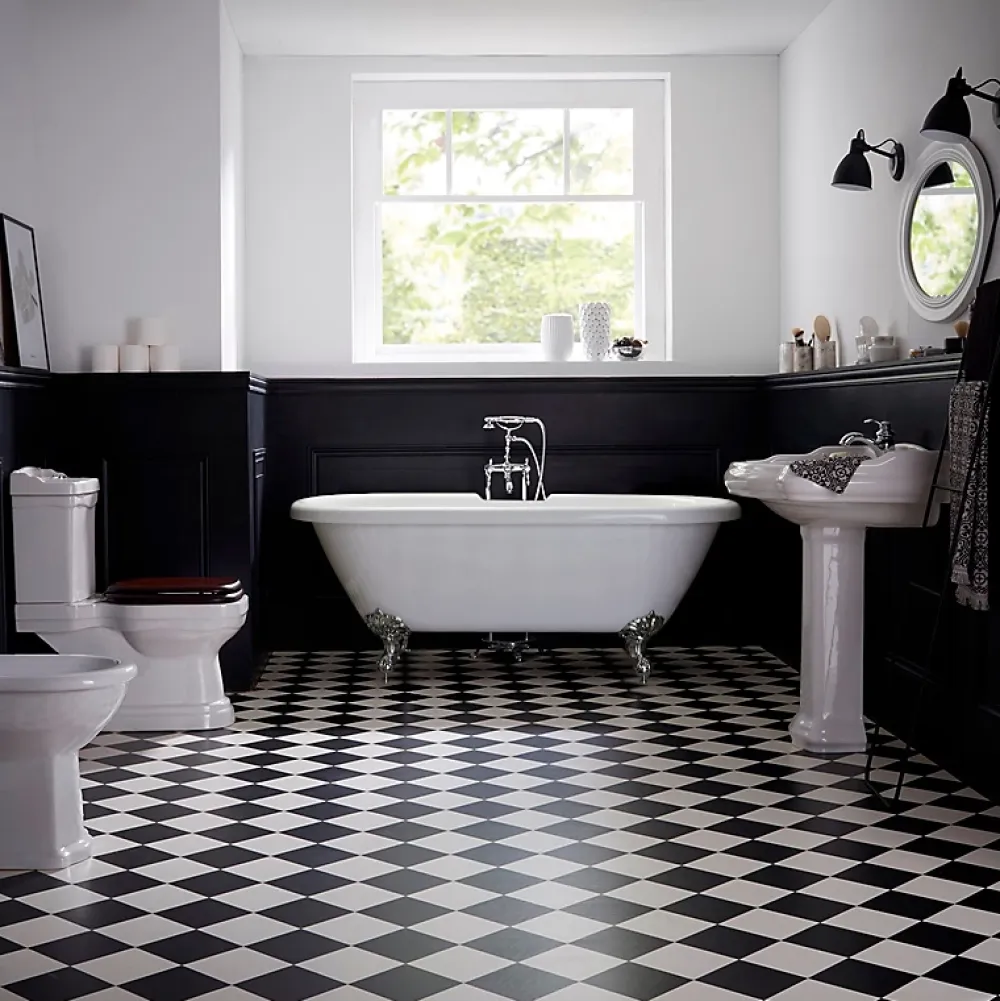 Planète Bain Baignoire ilot Charly blanche avec pieds patte d 'aigle chrome