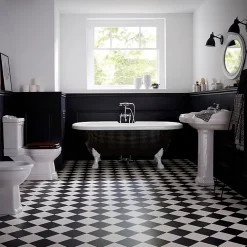 Planète Bain Baignoire ilot Charly ovale noire et blanche avec piétements blanc