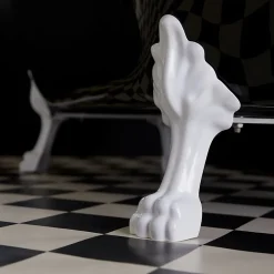 Planète Bain Baignoire ilot Charly ovale noire et blanche avec piétements blanc