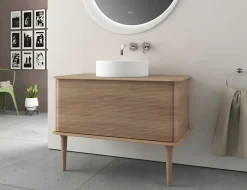 Baden Meuble sous-vasque à suspendre l.95 cm avec plan de toilette, vasque à poser et pieds H.29 cm, effet chêne tabac, Idra