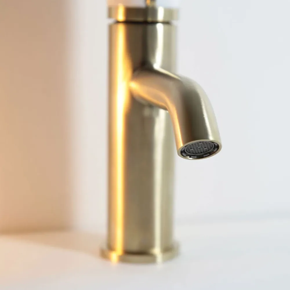 Essebagno Mitigeur lavabo bas avec vidage en laiton doré et marbre blanc, Manopola