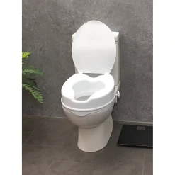 Aidapt Siège de toilette surélevé en plastique avec couvercle Senator blanc - Hauteur 10 cm